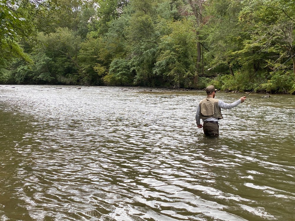 Andy roll casting in the Green River