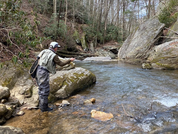 Greg casting to a pocket of water around the bend